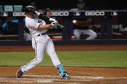 May 5, 2021; Miami, Florida, USA; Miami Marlins right fielder Adam Duvall (14) connects for a three-run homerun in the 2nd inning against the Arizona Diamondbacks at loanDepot park. Mandatory Credit: Jasen Vinlove-USA TODAY Sports