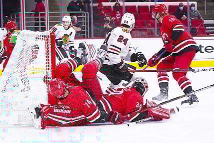 May 6, 2021; Raleigh, North Carolina, USA;  Carolina Hurricanes defenseman Jaccob Slavin (74) collides with goaltender Petr Mrazek (34) during the first period at PNC Arena. Mandatory Credit: James Guillory-USA TODAY Sports