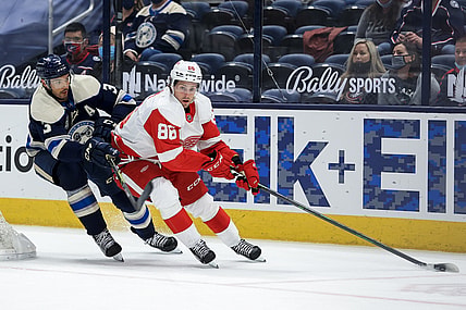 May 7, 2021; Columbus, Ohio, USA; Columbus Blue Jackets defenseman Seth Jones (3) skates as Detroit Red Wings left wing Mathias Brome (86) controls the puck in the second period at Nationwide Arena. Mandatory Credit: Aaron Doster-USA TODAY Sports