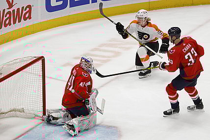 May 7, 2021; Washington, District of Columbia, USA; Philadelphia Flyers right wing Wade Allison (57) scores a goal on Washington Capitals goaltender Vitek Vanecek (41) in the second period at Capital One Arena. Mandatory Credit: Geoff Burke-USA TODAY Sports