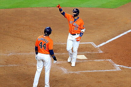 May 7, 2021; Houston, Texas, USA; Houston Astros first baseman Yuli Gurriel (10) crosses home plate after hitting a two-run home run to left field against the Toronto Blue Jays during the fifth inning at Minute Maid Park. Mandatory Credit: Erik Williams-USA TODAY Sports