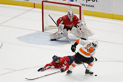 May 7, 2021; Washington, District of Columbia, USA; Washington Capitals defenseman Trevor van Riemsdyk (57) blocks a shot by Philadelphia Flyers center Nolan Patrick (19) in front of Capitals goaltender Vitek Vanecek (41) in the third period at Capital One Arena. Mandatory Credit: Geoff Burke-USA TODAY Sports