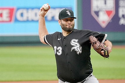 May 8, 2021; Kansas City, Missouri, USA; Chicago White Sox starting pitcher Lance Lynn (33) delivers a pitch in the first inning against the Kansas City Royals at Kauffman Stadium. Mandatory Credit: Denny Medley-USA TODAY Sports