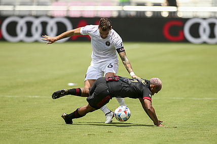 May 9, 2021; Fort Lauderdale, FL, Fort Lauderdale, FL, USA; Atlanta United forward Josef Martinez (7) gets fouled by Inter Miami CF defender Leandro Gonzalez (6) during the first half at DRV PNK Stadium. Mandatory Credit: Sam Navarro-USA TODAY Sports