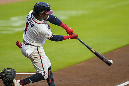 May 11, 2021; Cumberland, Georgia, USA; Atlanta Braves second baseman Ozzie Albies (1) hits an RBI single against the Toronto Blue Jays during the first inning at Truist Park. Mandatory Credit: Dale Zanine-USA TODAY Sports