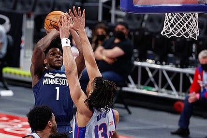May 11, 2021; Detroit, Michigan, USA;  Minnesota Timberwolves forward Anthony Edwards (1) shoots on Detroit Pistons center Jahlil Okafor (13) in the first half at Little Caesars Arena. Mandatory Credit: Rick Osentoski-USA TODAY Sports