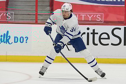 May 12, 2021; Ottawa, Ontario, CAN; Toronto Maple Leafs center Auston Mathews (34) controls the puck in the first period against the Ottawa Senators at the Canadian Tire Centre. Mandatory Credit: Marc DesRosiers-USA TODAY Sports