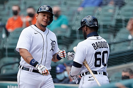 May 13, 2021; Detroit, Michigan, USA;  Detroit Tigers designated hitter Miguel Cabrera (24) receives congratulations from  center fielder Akil Baddoo (60) after scoring in the second inning wk. at Comerica Park. Mandatory Credit: Rick Osentoski-USA TODAY Sports