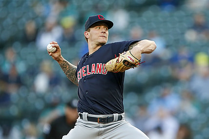 May 13, 2021; Seattle, Washington, USA; Cleveland Indians starting pitcher Zach Plesac (34) throws against the Seattle Mariners during the first inning at T-Mobile Park. Mandatory Credit: Joe Nicholson-USA TODAY Sports