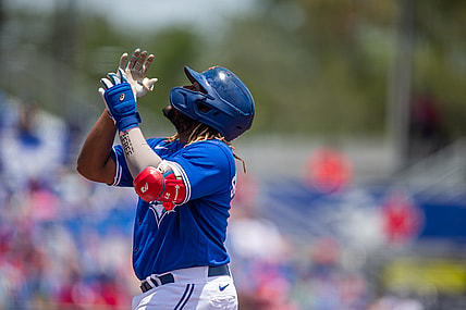 May 16, 2021; Dunedin, Florida, USA; Toronto Blue Jays first baseman Vladimir Guerrero Jr. (27) celebrates a hit  during the first inning of a game against the Philadelphia Phillies at TD Ballpark. Mandatory Credit: Mary Holt-USA TODAY Sports