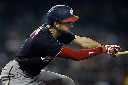 May 16, 2021; Phoenix, Arizona, USA; Washington Nationals shortstop Trea Turner (7) hits an infield single against the Arizona Diamondbacks during the third inning at Chase Field. Mandatory Credit: Joe Camporeale-USA TODAY Sports