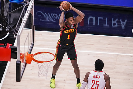 May 16, 2021; Atlanta, Georgia, USA; Atlanta Hawks forward Nathan Knight (1) passes the ball against the Houston Rockets during the first half at State Farm Arena. Mandatory Credit: Dale Zanine-USA TODAY Sports