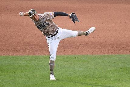 May 16, 2021; San Diego, California, USA; San Diego Padres shortstop Ha-seong Kim (7) throws to first base late on a single by St. Louis Cardinals first baseman Paul Goldschmidt (not pictured) during the sixth inning at Petco Park. Mandatory Credit: Orlando Ramirez-USA TODAY Sports