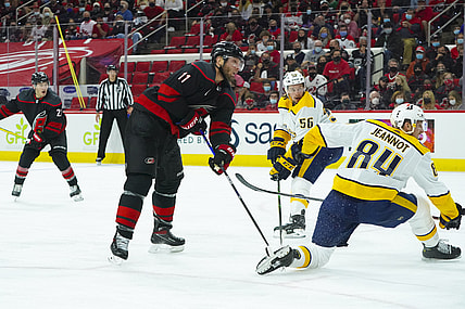 May 17, 2021; Raleigh, North Carolina, USA; Carolina Hurricanes center Jordan Staal (11) watches his third period goal against the Nashville Predators in game one of the first round of the 2021 Stanley Cup Playoffs at PNC Arena. Mandatory Credit: James Guillory-USA TODAY Sports