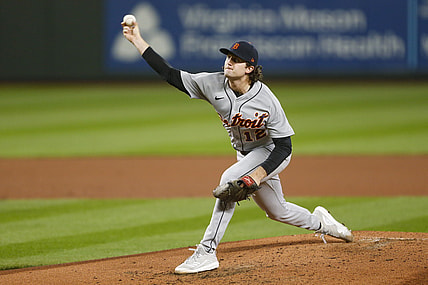 May 17, 2021; Seattle, Washington, USA; Detroit Tigers starting pitcher Casey Mize (12) throws against the Seattle Mariners during the third inning at T-Mobile Park. Mandatory Credit: Joe Nicholson-USA TODAY Sports