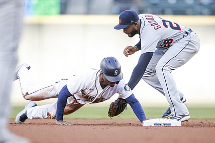 May 19, 2021; Seattle, Washington, USA; Seattle Mariners center fielder Kyle Lewis (1) steals second base against Detroit Tigers shortstop Niko Goodrum (28) during the first inning at T-Mobile Park. Mandatory Credit: Joe Nicholson-USA TODAY Sports