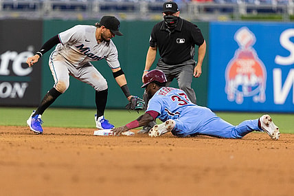 May 20, 2021; Philadelphia, Pennsylvania, USA; Philadelphia Phillies center fielder Odubel Herrera (37) steals second base past Miami Marlins second baseman Isan Diaz (1) during the third inning at Citizens Bank Park. Mandatory Credit: Bill Streicher-USA TODAY Sports