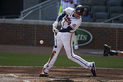 May 22, 2021; Atlanta, Georgia, USA; Atlanta Braves first baseman Freddie Freeman (5) hits a RBI single against the Pittsburgh Pirates in the second inning at Truist Park. Mandatory Credit: Brett Davis-USA TODAY Sports