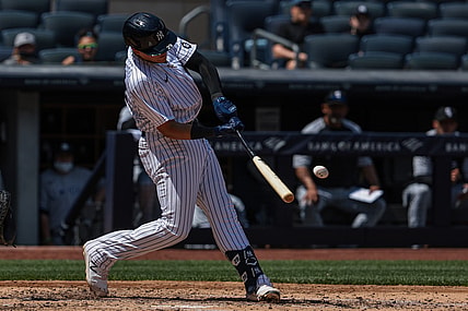 May 23, 2021; Bronx, New York, USA; New York Yankees third baseman Gio Urshela (29) hits a single during the third inning against the Chicago White Sox at Yankee Stadium. Mandatory Credit: Vincent Carchietta-USA TODAY Sports
