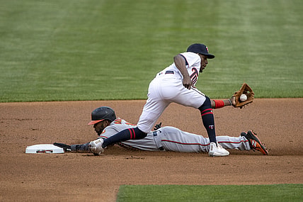 May 24, 2021; Minneapolis, Minnesota, USA; Baltimore Orioles center fielder Cedric Mullins (31) slides safely into second base before Minnesota Twins second baseman Nick Gordon (1) can make a tag in the first inning at Target Field. Mandatory Credit: Jesse Johnson-USA TODAY Sports