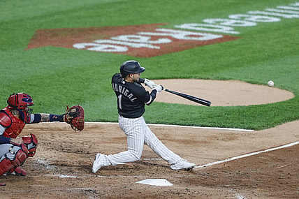 May 25, 2021; Chicago, Illinois, USA; Chicago White Sox second baseman Nick Madrigal (1) hits an rbi single against the St. Louis Cardinals during the second inning at Guaranteed Rate Field. Mandatory Credit: Kamil Krzaczynski-USA TODAY Sports