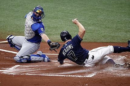 May 27, 2021; St. Petersburg, Florida, USA;  Tampa Bay Rays designated hitter Austin Meadows (17) scores a run as he slides in safe at home plate ad Kansas City Royals catcher Cam Gallagher (36) attempted to tag him out during the first inning at Tropicana Field. Mandatory Credit: Kim Klement-USA TODAY Sports