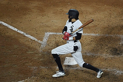 May 27, 2021; Chicago, Illinois, USA; Chicago White Sox center fielder Billy Hamilton (0) hits a RBI single in the sixth inning against the Baltimore Orioles at Guaranteed Rate Field. Mandatory Credit: Quinn Harris-USA TODAY Sports