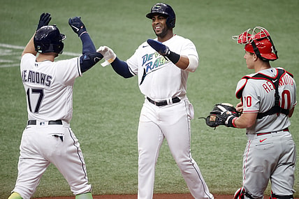 May 29, 2021; St. Petersburg, Florida, USA;  Tampa Bay Rays designated hitter Austin Meadows (17) and Tampa Bay Rays first baseman Yandy Diaz (2) celebrate as they score runs during the first inning against the Philadelphia Phillies at Tropicana Field. Mandatory Credit: Kim Klement-USA TODAY Sports