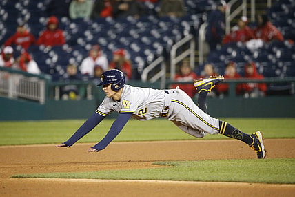 May 29, 2021; Washington, District of Columbia, USA; Milwaukee Brewers third baseman Luis Urias (2) steals second base during the fourth inning against the Washington Nationals at Nationals Park. Mandatory Credit: Amber Searls-USA TODAY Sports