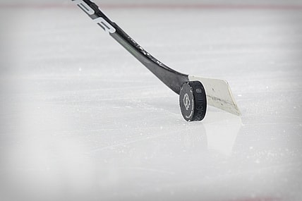 Mar 16, 2021; Dallas, Texas, USA; A view of an NHL puck and hockey stick before the game between the Dallas Stars and the Tampa Bay Lightning at the American Airlines Center. Mandatory Credit: Jerome Miron-USA TODAY Sports