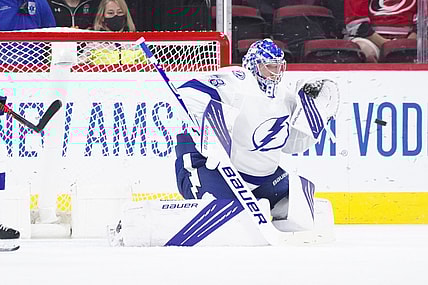Jun 1, 2021; Raleigh, North Carolina, USA; Tampa Bay Lightning goaltender Andrei Vasilevskiy (88) gets ready to make a glove save against the Carolina Hurricanes in game two of the second round of the 2021 Stanley Cup Playoffs at PNC Arena. Mandatory Credit: James Guillory-USA TODAY Sports