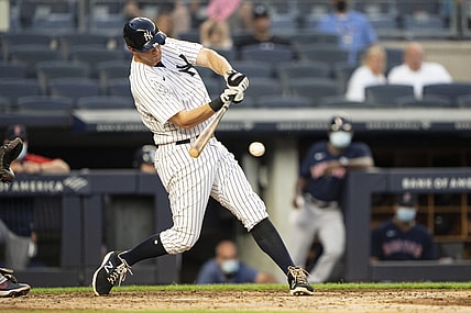Jun 5, 2021; Bronx, New York, USA;  New York Yankees second baseman DJ LeMahieu (26) hits a single during the third inning at Yankee Stadium. Mandatory Credit: Gregory Fisher-USA TODAY Sports