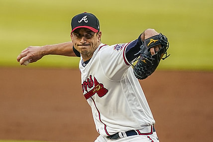 Jun 5, 2021; Cumberland, Georgia, USA; Atlanta Braves starting pitcher Charlie Morton (50) pitches against the Los Angeles Dodgers during the third inning at Truist Park. Mandatory Credit: Dale Zanine-USA TODAY Sports