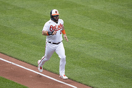Jun 6, 2021; Baltimore, Maryland, USA; Baltimore Orioles right fielder DJ Stewart (24) scores a run on Baltimore Orioles center fielder Cedric Mullins (31) (not pictured) RBI single during the second inning against the Cleveland Indians at Oriole Park at Camden Yards. Mandatory Credit: Gregory Fisher-USA TODAY Sports