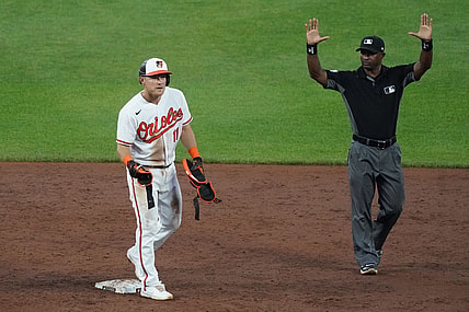 Jun 8, 2021; Baltimore, Maryland, USA; Baltimore Orioles second baseman Pat Valaika (11) calls for timeout after driving in a run with a double in the third inning against the New York Mets at Oriole Park at Camden Yards. Mandatory Credit: Mitch Stringer-USA TODAY Sports