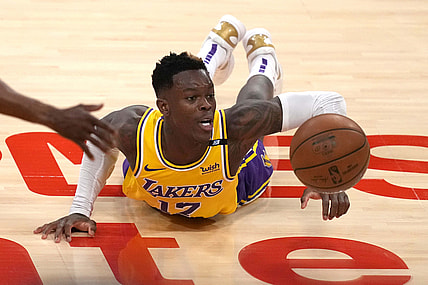 Jun 3, 2021; Los Angeles, California, USA; Los Angeles Lakers guard Dennis Schroder (17) reaches for the ball against the Phoenix Suns in the second half during game six in the first round of the 2021 NBA Playoffs. at Staples Center. Mandatory Credit: Kirby Lee-USA TODAY Sports