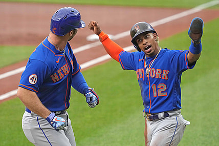 Jun 9, 2021; Baltimore, Maryland, USA; New York Mets first baseman Pete Alonso (20) is greeted by shortstop Francisco Lindor (12) who scored on his two run home run in the first inning against the Baltimore Orioles at Oriole Park at Camden Yards. Mandatory Credit: Mitch Stringer-USA TODAY Sports