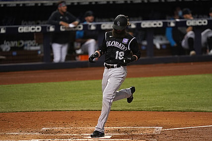Jun 9, 2021; Miami, Florida, USA; Colorado Rockies right fielder Charlie Blackmon (19) scores a run in the 3rd inning against the Miami Marlins at loanDepot park. Mandatory Credit: Jasen Vinlove-USA TODAY Sports