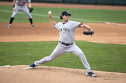 Jun 9, 2021; Minneapolis, Minnesota, USA; New York Yankees starting pitcher Gerrit Cole (45) pitches during the first inning against the Minnesota Twins at Target Field. Mandatory Credit: Jordan Johnson-USA TODAY Sports