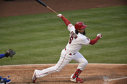 Jun 9, 2021; Anaheim, California, USA; Los Angeles Angels third baseman Anthony Rendon (6) follows through on a swing after hitting a two-run double during the third inning against the Kansas City Royals at Angel Stadium. Mandatory Credit: Kelvin Kuo-USA TODAY Sports