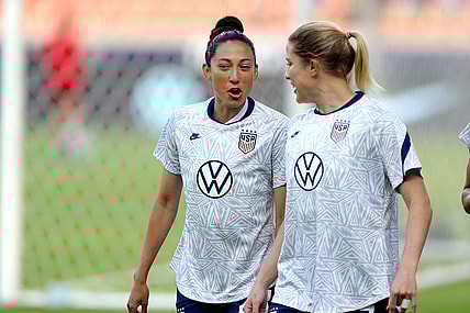 Jun 10, 2021; Houston, Texas, USA; United States forward Christen Press (23, left) and defender Abby Dahlkemper (7) take the field for warmups prior to the match against Portugal during a WNT Summer Series international friendly soccer match at BBVA Stadium. Mandatory Credit: Erik Williams-USA TODAY Sports