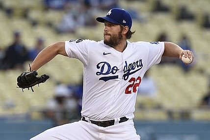 Jun 11, 2021; Los Angeles, California, USA; Los Angeles Dodgers starting pitcher Clayton Kershaw (22) delivers a pitch during the first inning against the Texas Rangers at Dodger Stadium. Mandatory Credit: Kelvin Kuo-USA TODAY Sports