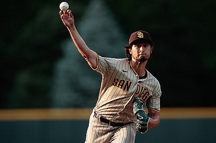 Jun 15, 2021; Denver, Colorado, USA; San Diego Padres starting pitcher Yu Darvish (11) pitches in the first inning against the Colorado Rockies at Coors Field. Mandatory Credit: Isaiah J. Downing-USA TODAY Sports