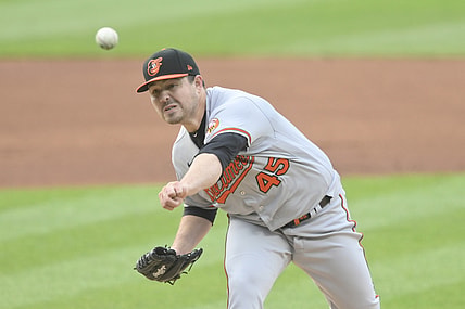 Jun 16, 2021; Cleveland, Ohio, USA; Baltimore Orioles starting pitcher Keegan Akin (45) delivers a pitch in the first inning against the Cleveland Indians at Progressive Field. Mandatory Credit: David Richard-USA TODAY Sports