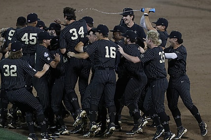 Jun 19, 2021; Omaha, Nebraska, USA;  Vanderbilt Commodores third baseman Jayson Gonzalez (99) celebrates after defeating the Arizona Wildcats  at TD Ameritrade Park. Mandatory Credit: Bruce Thorson-USA TODAY Sports