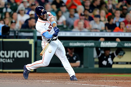 Jun 20, 2021; Houston, Texas, USA; Houston Astros third baseman Abraham Toro (13) hits a single to right field against the Chicago White Sox during the third inning at Minute Maid Park. Mandatory Credit: Erik Williams-USA TODAY Sports