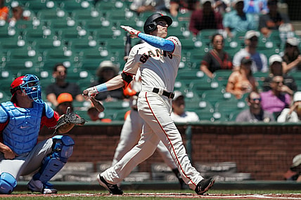 Jun 20, 2021; San Francisco, California, USA; San Francisco Giants right fielder Mike Yastrzemski (5) hits a home run during the first inning against the Philadelphia Phillies at Oracle Park. Mandatory Credit: Darren Yamashita-USA TODAY Sports