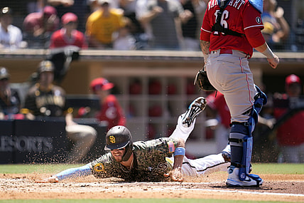 Jun 20, 2021; San Diego, California, USA;  San Diego Padres right fielder Wil Myers (5) scores a run against the Cincinnati Reds in the third inning at Petco Park. Mandatory Credit: Ray Acevedo-USA TODAY Sports