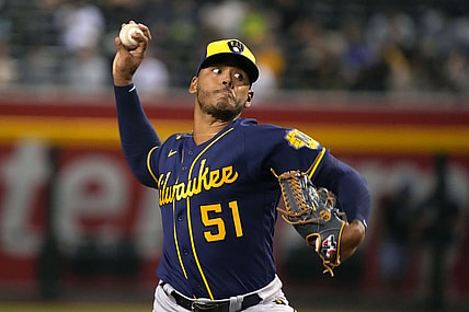 Jun 22, 2021; Phoenix, Arizona, USA; Milwaukee Brewers pitcher Freddy Peralta (51) throws a pitch against the Arizona Diamondbacks in the first inning at Chase Field. Mandatory Credit: Rick Scuteri-USA TODAY Sports