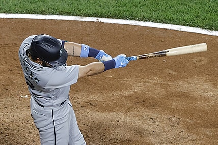 Jun 25, 2021; Chicago, Illinois, USA; Seattle Mariners catcher Luis Torrens (22) hits a two-run home run against the Chicago White Sox during the seventh inning at Guaranteed Rate Field. Mandatory Credit: Kamil Krzaczynski-USA TODAY Sports
